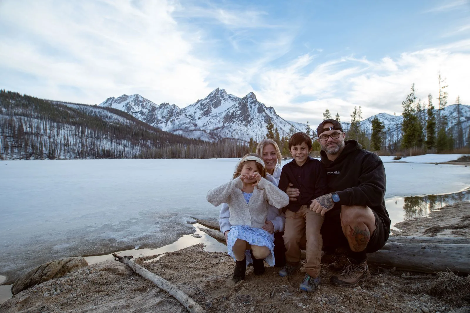 Jason with his wife and twins at a lake in the Sawtooth mountains